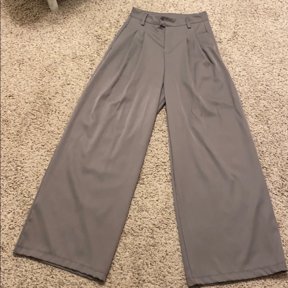 High-waisted, wide-leg, pleated trousers